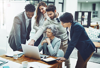 Image showing Business people, laptop or man pointing in meeting for ideas, strategy or planning a company project. CEO, teamwork or employees in group discussion or talking with leadership for a vision in office