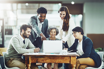 Image showing Business people, laptop or black man pointing in meeting for ideas, online strategy or planning project. Digital, teamwork or happy employees talking or speaking with leadership for growth in office