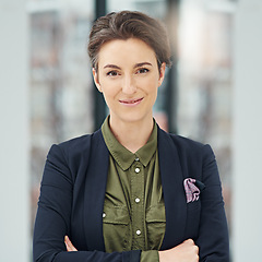 Image showing Portrait, business woman and smile with arms crossed in office workplace. Face, confidence and female professional, entrepreneur and person from Australia with happiness, pride for career and job.