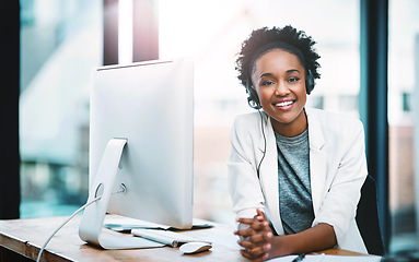 Image showing Call center, portrait of businesswoman with headset and computer at desk in her office. Online communication or corporate, customer service or happy consultant and black woman smile at workplace