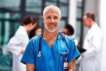 Image showing Healthcare, portrait of senior doctor or nurse with smile in hospital, happiness and support in medical career. Health care, confidence and medicine, happy man or nursing professional in workplace.