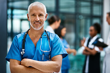 Image showing Happiness, portrait of doctor or nurse with mockup in hospital lobby, healthcare and support in medical career. Health care, confidence and medicine, happy man or nursing professional in workplace.