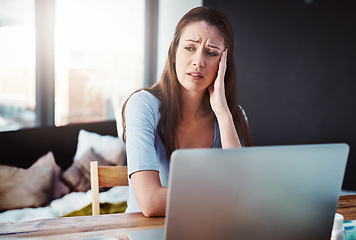 Image showing Home office, remote work and woman with stress for a deadline freelance project with a laptop. Burnout, tired and female freelancer with fatigue doing research at her desk or workspace at her house.