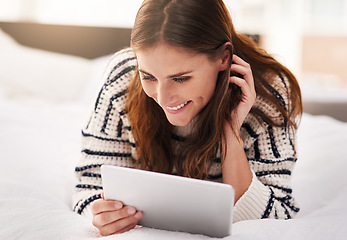 Image showing Relax, happy and tablet with woman on bed for social media, communication and digital. Internet, technology and website with female person reading online at home for ebook, streaming and happiness