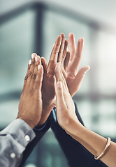 Image showing Business people, hands and high five for winning, teamwork or success together at office. Group touching hand in team win, victory or achievement for company goals, unity or solidarity at workplace