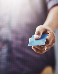 Image showing Man, hand and credit card in finance for checkout payment, purchase or buying at retail store. Closeup of male person, hands or customer showing debit for shopping, transaction or banking to pay