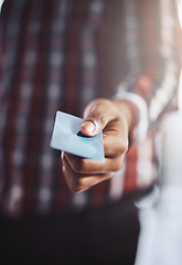 Image showing Man, hand and credit card for online shopping, payment or checkout and purchase at retail store. Closeup of male person, hands or customer showing debit for ecommerce, transaction or banking to pay