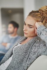 Image showing Sad, depression and woman in conflict with her boyfriend in the living room of their apartment. Upset, disappointed and moody female person in argument, fight or breakup with partner at their home.