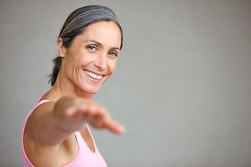 Image showing Senior woman, portrait and yoga stretching in studio with mockup space for health, balance and exercise on wall background. Face, meditation and mature lady happy with zen for workout or peace