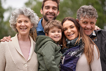 Image showing Family, grandparents and portrait of parents with kid in a park on outdoor vacation or holiday together. Face of old people, happiness and happy mother and father for love or care in nature