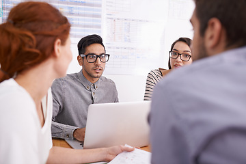 Image showing People in creative meeting, brainstorming and team in conference room with laptop. Plan, collaboration with men and women in strategy discussion at digital marketing startup, productivity and ideas