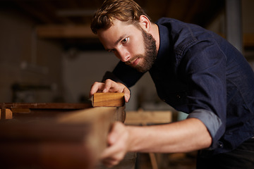 Image showing Contractor, wood sanding and man in workshop working on building construction and architecture. Home improvement, maintenance and handyman work of a male employee with carpentry tool for woodwork