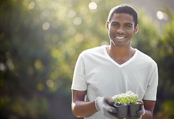 Image showing Black man, sustainability and plant growth in nature for nature, environment development and mockup space. Gardener, growing and sustainable eco friendly work of a person with care for gardening