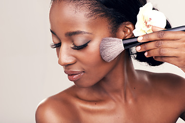 Image showing Brush, elegant makeup and face of black woman with mockup in studio with cosmetic application tool. Skincare, blush and cosmetics, beauty model with luxury contour powder on cheek on white background