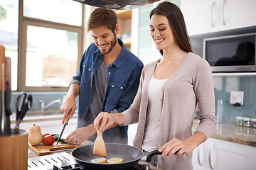 Image showing Happy couple, food and cooking together in the kitchen on pan with healthy organic nutrition or diet for dinner at home. Man helping woman with smile in happiness making meal with vegetables on stove