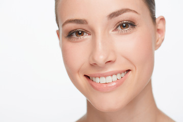 Image showing Smile, dental care and portrait of a woman with treatment isolated on white background in studio for beauty. Happy, face closeup and model showing teeth for oral hygiene and healthy, natural skin