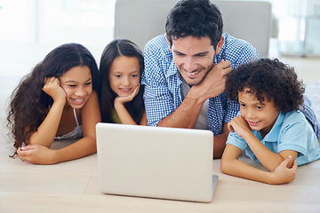 Image showing Laptop, relax on floor and dad and children watching social media video, online website or family movies. Adoption, bonding and happy family kids with father streaming home broadcast film on pc