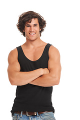 Image showing Fashion, happy and portrait of man on a white background with confidence, crossed arms and muscles. Confident, happiness and isolated Australian male person in studio for wellness, smile and pride