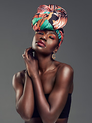 Image showing Fashion, beauty and face of black woman in studio on gray background for glamour, cosmetics and makeup. Jewellery, designer and female person in exotic jewelry, African style and head scarf in studio