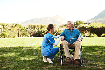 Image showing Senior man, nurse and wheelchair in nature for healthcare support, life insurance or garden at nursing home. Happy elderly male and woman caregiver helping person with disability or patient outdoors