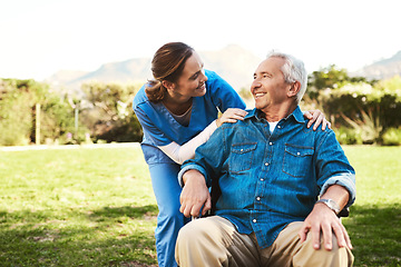 Image showing Senior man, nurse and wheelchair for life insurance, healthcare support or garden at nursing home. Happy elderly male and woman caregiver helping patient or person with a disability in the outdoors