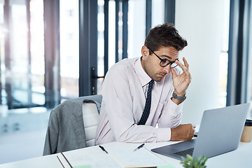 Image showing Headache, anxiety and man on laptop in office frustrated with glitch, mistake or crisis. Stress, burnout and male business person angry with fail, 404 or bad review, deadline report or tech delay