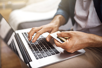 Image showing Hands, laptop and credit card for man, typing and online shopping with cybersecurity, tech or payment. Guy, computer and fintech on internet store for discount, sale or deal with password for banking