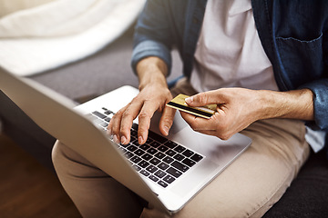 Image showing Hands, laptop and credit card for man, payment and online shopping with cybersecurity, tech and typing. Guy, computer and fintech on internet store for discount, sale and deal with banking password