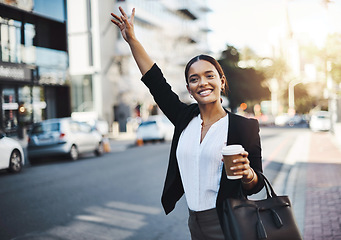 Image showing Happy woman, travel and hands in city for taxi, lift or street transportation with coffee outdoors. Business female waving hand waiting for transport, ride or pickup on road sidewalk in urban town