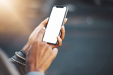 Image showing Woman, hands and phone mockup screen in city for communication, social media or texting outdoors. Hand of female on mobile smartphone display for networking, advertising or travel with mock up space