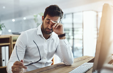 Image showing Sad, tired and a man at work with burnout, career problem or anxiety from deadline. Corporate, working and a businessman with fatigue, mental health issue and stress from mistake in professional job