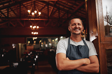 Image showing Happy man, portrait and small business owner of restaurant, cafe or pub with a smile for career pride. Male entrepreneur person as manager, barista and waiter at door for shop welcome greeting