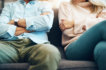 Image showing Divorce, angry and couple fight arms crossed due to family law problem in a marriage with conflict in a home lounge. Anger, living room and partner or people frustrated, depressed and mad on a sofa