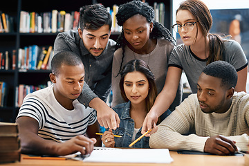 Image showing People, students in library and studying for exam or research for project, education and teamwork. Diversity, young men and women in study group and learning with collaboration on university campus