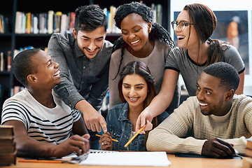 Image showing Students laughing in library, studying together for exam or research for project, education and teamwork. Diversity, funny and young men with women in study group, learn together and happy on campus