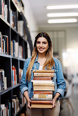 Image showing Woman in portrait, college student with stack of books in library and research, studying and learning on university campus. Female person with smile, education and scholarship with reading material