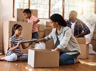 Image showing Moving, family and packing boxes in home living room together with children, mom and dad. Property, real estate investment and house move with couple, kids helping box and cardboard unpacking