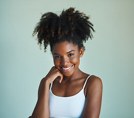 Image showing Smile, confidence and portrait of young black woman on studio background with afro, happiness and skincare. Beauty, dermatology and happy African girl, model with mockup, skin glow and beautiful face