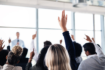 Image showing Conference, convention and business people with hands for a question, vote or volunteering. Corporate event, meeting and hand raised in a training seminar for questions, voting or audience opinion