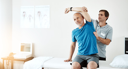 Image showing Stretching, physiotherapy and a man with a doctor for rehabilitation, fitness and health support. Healthcare, sports training and a physiotherapist with a senior patient and arm stretch after injury