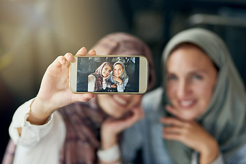 Image showing Islamic woman, friends and selfie with phone, smile and happiness for post on blog, web or social media. Happy muslim women, screen and smartphone for photography, profile picture and memory on app