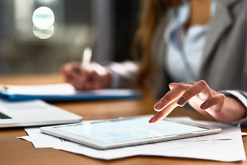 Image showing Business woman, tablet and screen for planning, legal research and writing documents at night. Typing, scroll and professional person or lawyer hands on digital tech, policy paperwork and job report