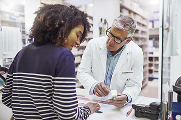 Image showing Black woman shopping, medicine or senior pharmacist in pharmacy for retail healthcare pills or advice. Trust, product or mature doctor helping a customer with prescription medication or medical drugs