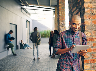 Image showing Smile, outdoor and man with a digital tablet, campus and search website for information, connection and meme. Male person, guy and student with technology, typing and social media with communication