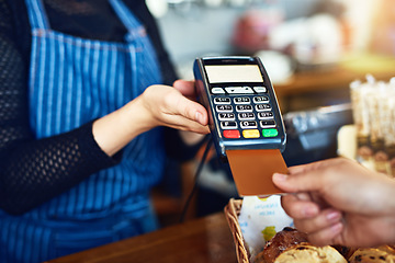 Image showing Credit card payment, cafe and hands with a machine at a restaurant for a service or food. Bakery, pay and a customer paying or buying a product at a coffee shop with a transaction from a worker