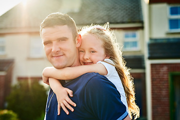 Image showing Portrait, children and a piggyback girl with her dad in the backyard of their home together for bonding. Face, kids and a playful man carrying his daughter outside in the garden during a summer day