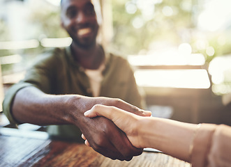 Image showing Shaking hands, people and coffee shop with remote work deal and thank you hand sign. Diversity, cafe and restaurant with business partnership with meeting greeting and handshake of freelancer