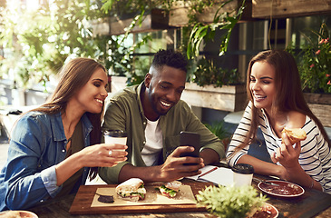 Image showing Breakfast, friends and people with phone in restaurant for social media, mobile app and website. Coffee shop, communication and happy men and women on smartphone for meme, funny internet and online