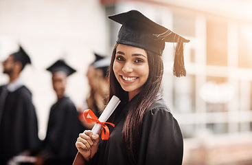 Image showing Woman, graduation and portrait of a college student with a diploma and smile outdoor. Female person excited to celebrate university achievement, education success and future at school graduate event