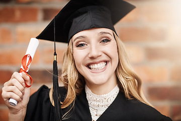 Image showing Woman, graduation and portrait of a university student with a diploma and smile on face. Female person excited to celebrate college achievement, education success and future outdoor at school event